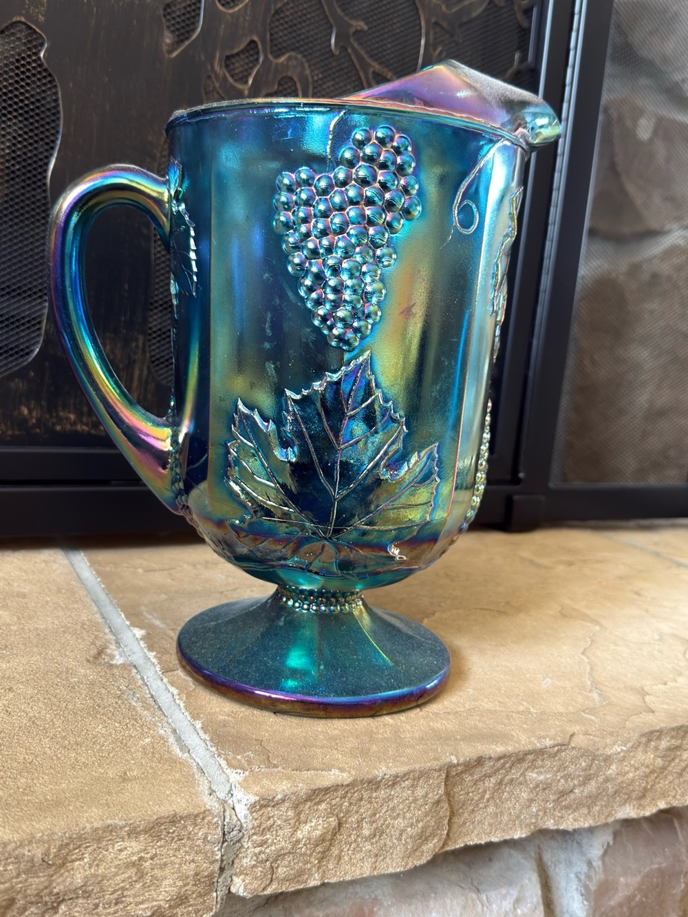 Iridescent Carnival Glass Pedestal Pitcher with Grape & Leaf Motif
